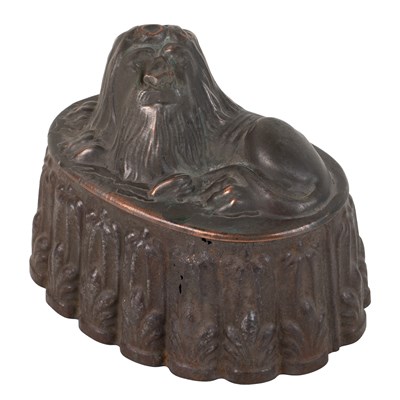 Lot 1029 - A Victorian lion decorated jelly mould
