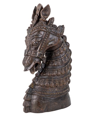 Lot 1116 - An Indian hardwood carving of a horse's head