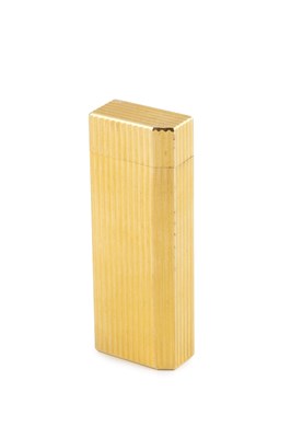Lot A gold plated lighter by Cartier, of reeded...