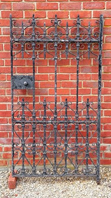 Lot 1493 - An old black-painted wrought iron gate