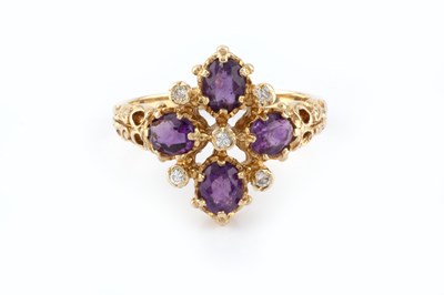 Lot 62 - An amethyst and diamond dress ring, designed...