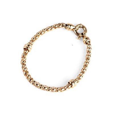 Lot 210 - Yellow precious metal bracelet with barrel...