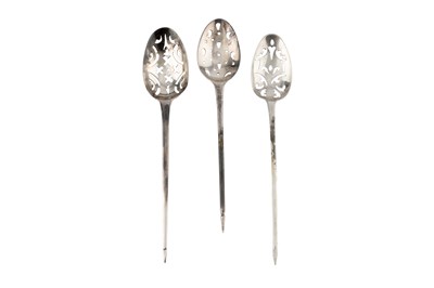 Lot 590 - Three 18th century silver mote spoons, with...