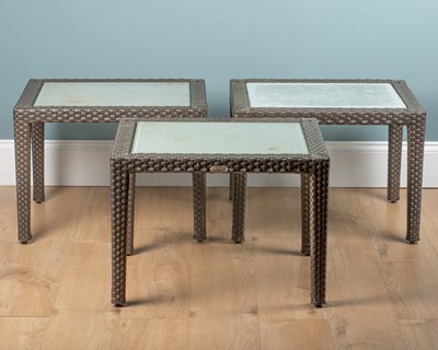 Lot 1357 - A set of three Gloucester garden occasional tables