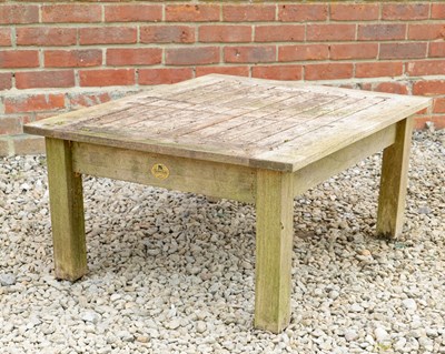 Lot 1383 - A Barlow Tyrie teak garden low occasional table