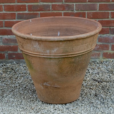Lot 1494 - A continental terracotta garden pot