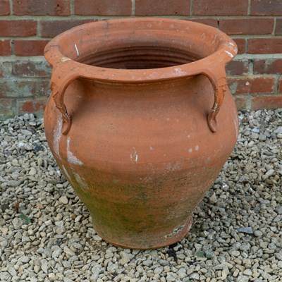 Lot 1329 - A hand thrown terracotta jar