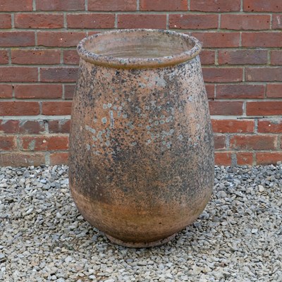 Lot 1495 - A continental terracotta ovoid garden jar