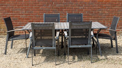 Lot 1338 - A garden table and six chairs