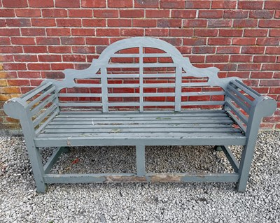 Lot 1412 - A green-painted teak Lutyens-style garden bench