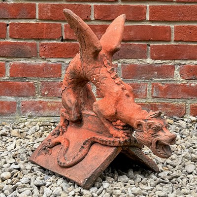 Lot 1477 - A cast terracotta coloured reconstituted stone roof finial
