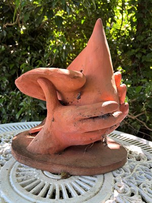 Lot 1470 - 20th/21st century English school, A terracotta sculpture depicting two hands releasing a dove