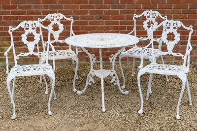 Lot 1364 - A garden table and four chairs