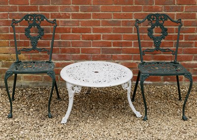 Lot 1472 - A pair of garden chairs and a low circular occasional table