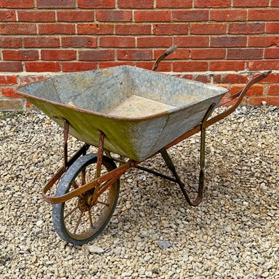 Lot 1502 - An old galvanised and wrought iron wheelbarrow
