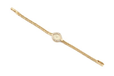 Lot 99 - A diamond set cocktail watch by Bucherer, the...