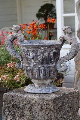 Lot 1438 - A pair of antique lead urns