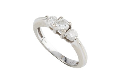 Lot 63 - A diamond three stone ring, the graduated...