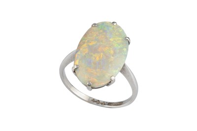 Lot An opal single stone ring, the oval cabochon...