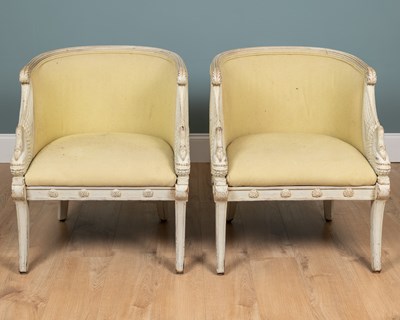 Lot 63 - A pair of French-style library chairs