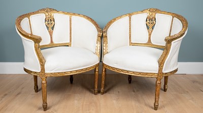 Lot 33 - A pair of French-style gilt salon chairs