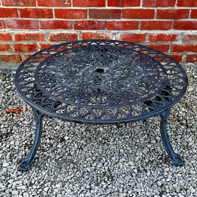 Lot 1369 - A black-painted low circular table