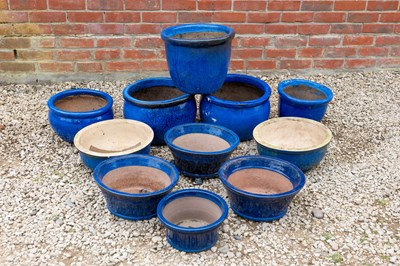 Lot 1453 - A group of eleven various blue glazed garden pots