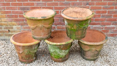 Lot 1421 - A set of five matching terracotta garden pots