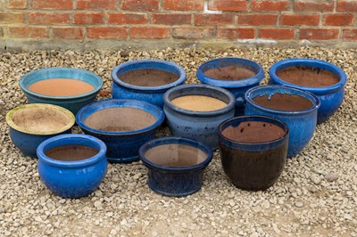 Lot 1403 - A collection of eleven various glazed pots