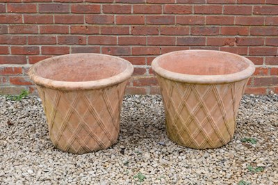 Lot 1395 - A pair of terracotta garden pots