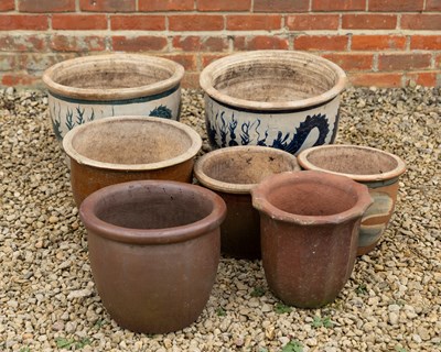 Lot 1491 - A pair of dragon glazed garden pots