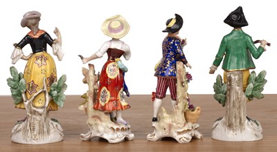 Lot 349 - Two porcelain pairs of figures including a...