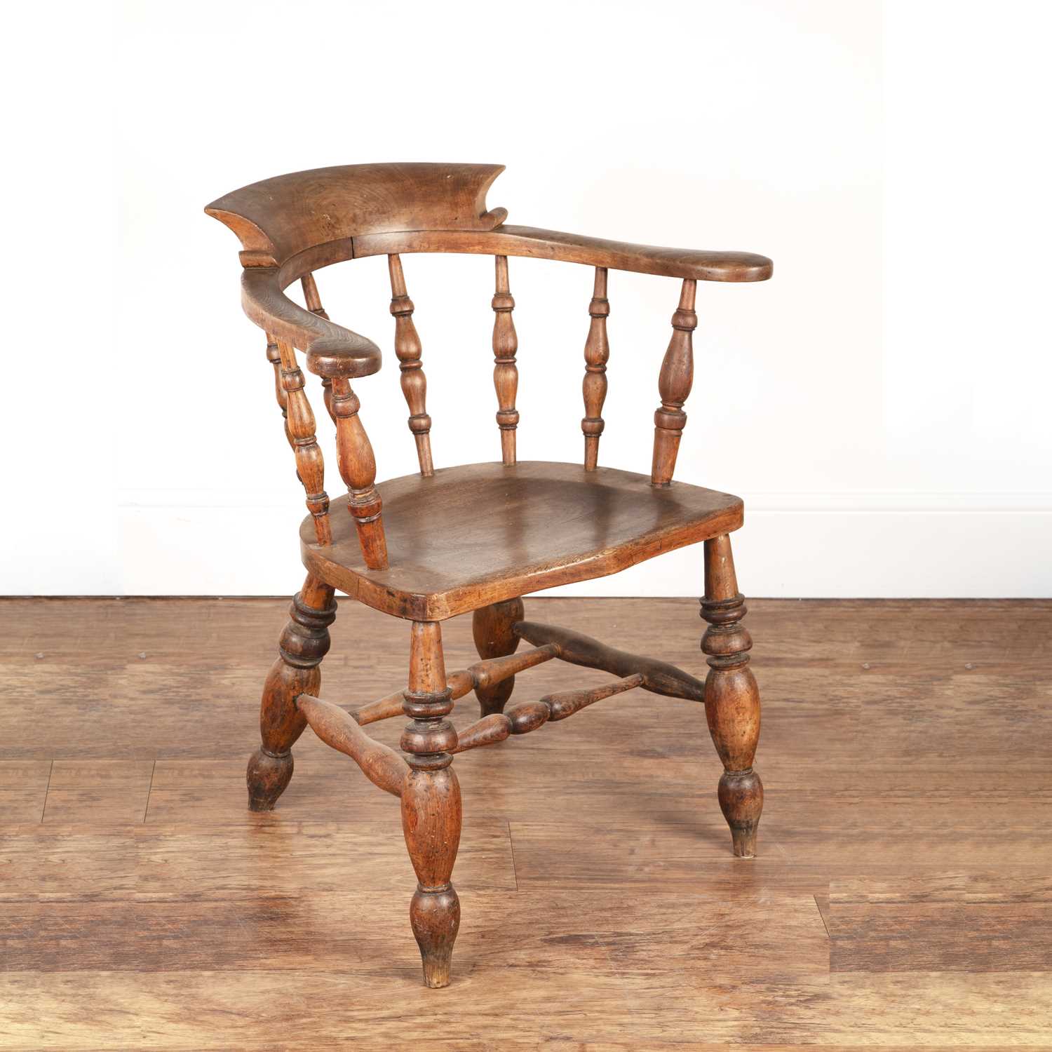 Lot 13 - Ash carved smoker's bow armchair with turned...
