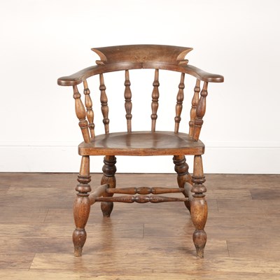 Lot 13 - Ash carved smoker's bow armchair with turned...