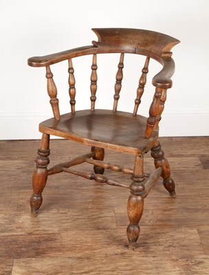 Lot 13 - Ash carved smoker's bow armchair with turned...