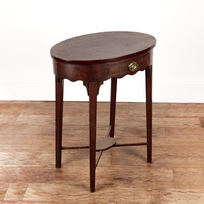 Lot 69 - Mahogany work table of oval form, with a...