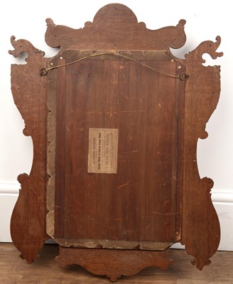 Lot 36 - Carved oak mirror 19th Century, with gryphon,...