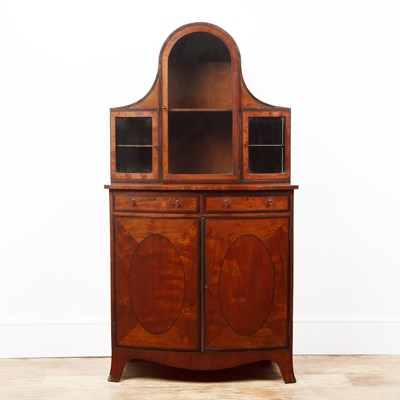 Lot 29 - Satinwood bow cabinet with an inlaid glazed...