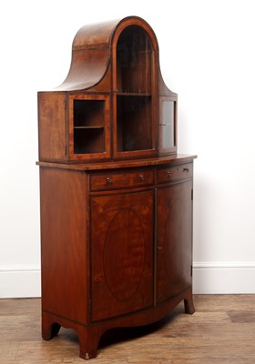Lot 29 - Satinwood bow cabinet with an inlaid glazed...