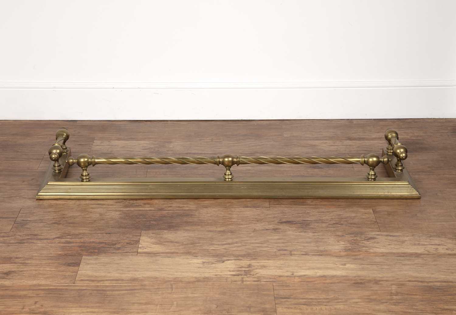 Lot 41 - Brass fender 19th Century, twisted decoration,...