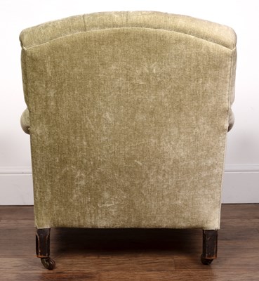 Lot 2 - In the manner of Howard and Sons armchair, of...
