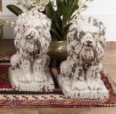 Lot 47 - Pair of earthenware glazed lions 20th Century,...