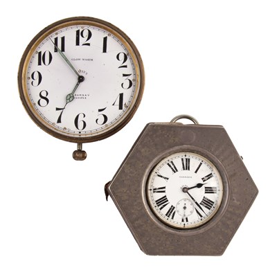 Lot 231 - Two travel clocks The first a Harrods 8 day...