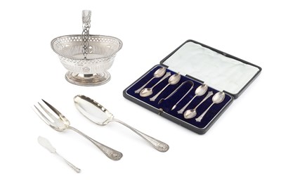 Lot 164 - A late Victorian silver swing handled sugar...