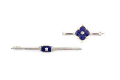 Lot 215 - An enamel and gem set bar brooch, centred with...
