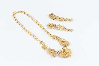 Lot A stone set costume necklace and matched ear...