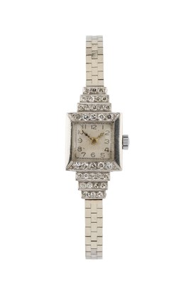Lot 307 - A diamond set cocktail watch, the square...