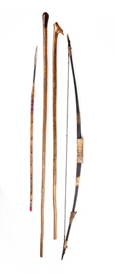 Lot 85 - Collection of tribal items to include a bow,...