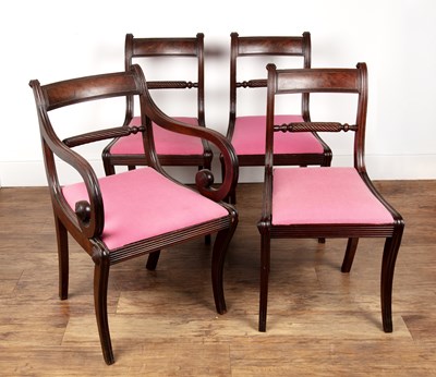 Lot 105 - Four mahogany and brass inlaid chairs Regency,...