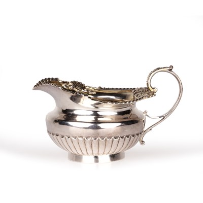 Lot 245 - George IV silver melon-shaped cream jug With...